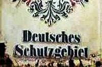 Schild mit Aufschrift "Deutsches Schutzgebiet"